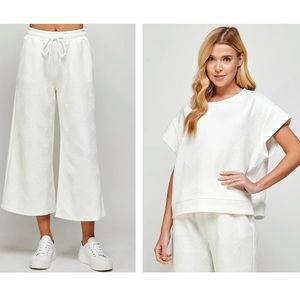 NWT three piece cream colored knit set by See and Be Seen. Size L.